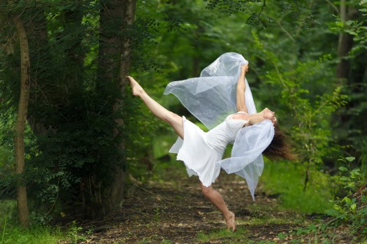 Mystical portrait of a beautiful woman in white